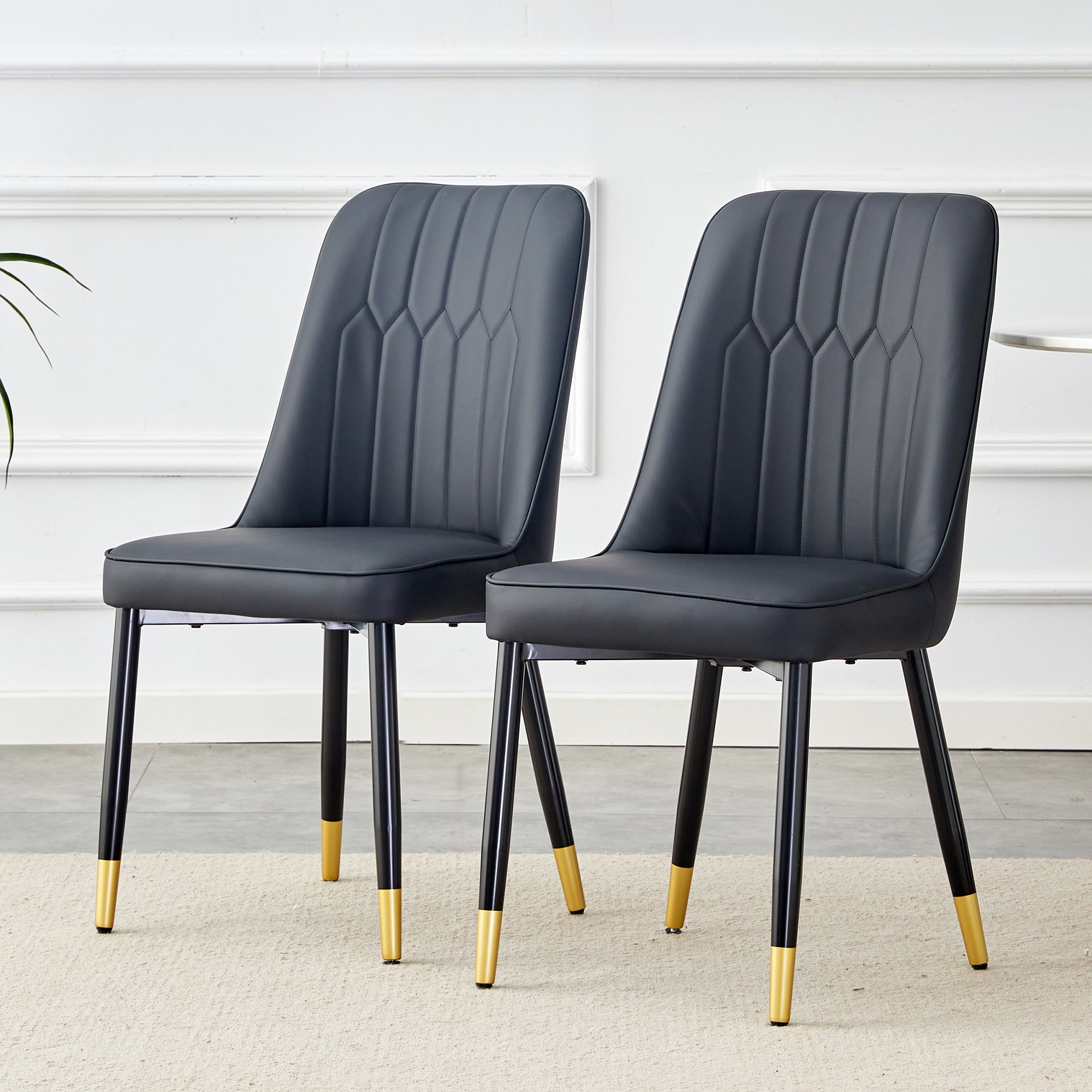 Logidon set van twee zwarte eetkamerstoelen met PU lederen rugkussens