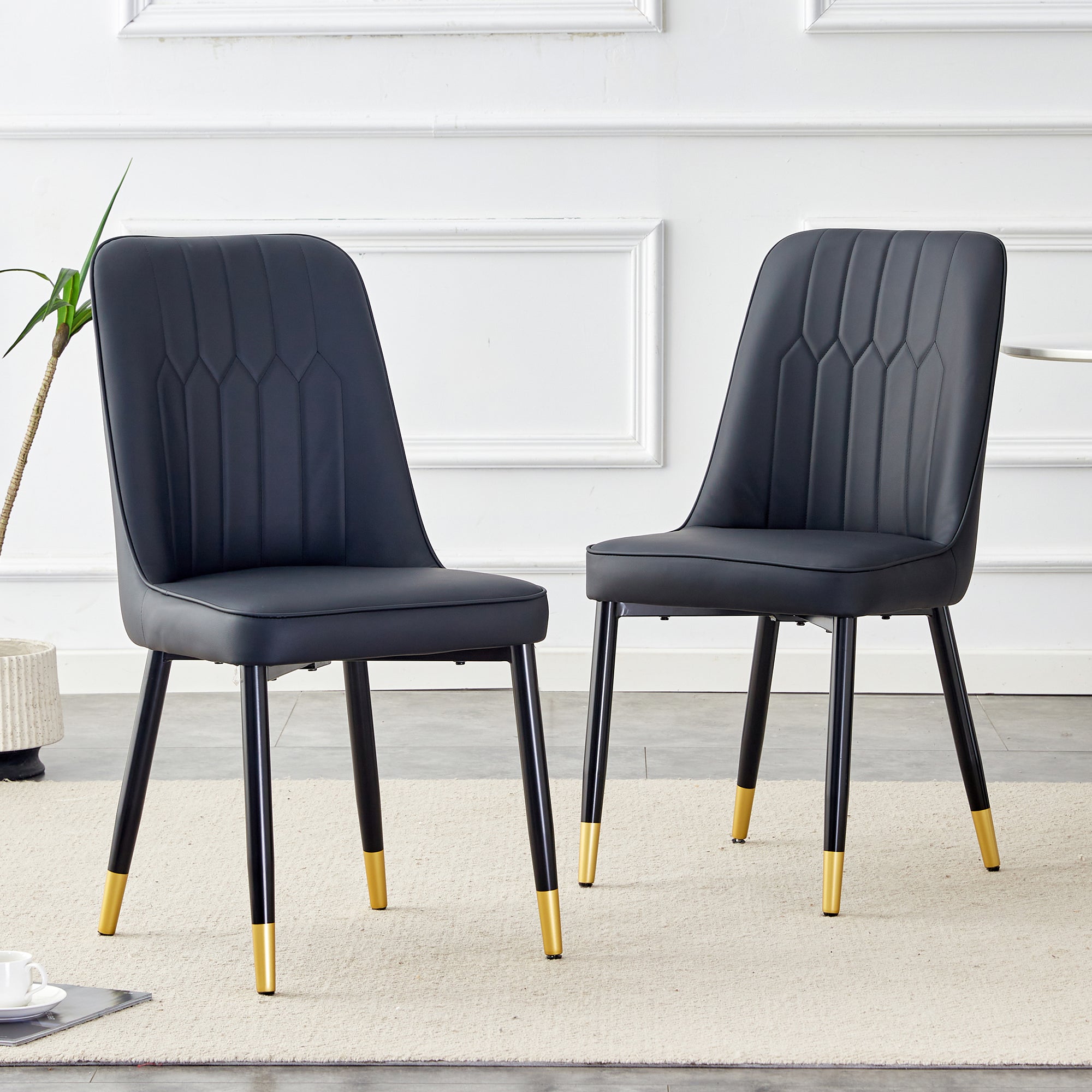 Logidon set van twee zwarte eetkamerstoelen met PU lederen rugkussens